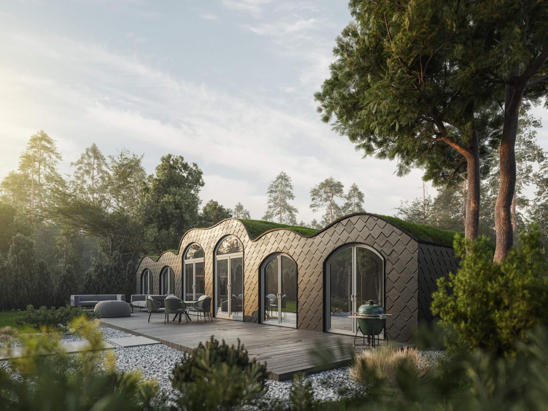 Aerial view of a large living space with terrace and hot tub set into woodland